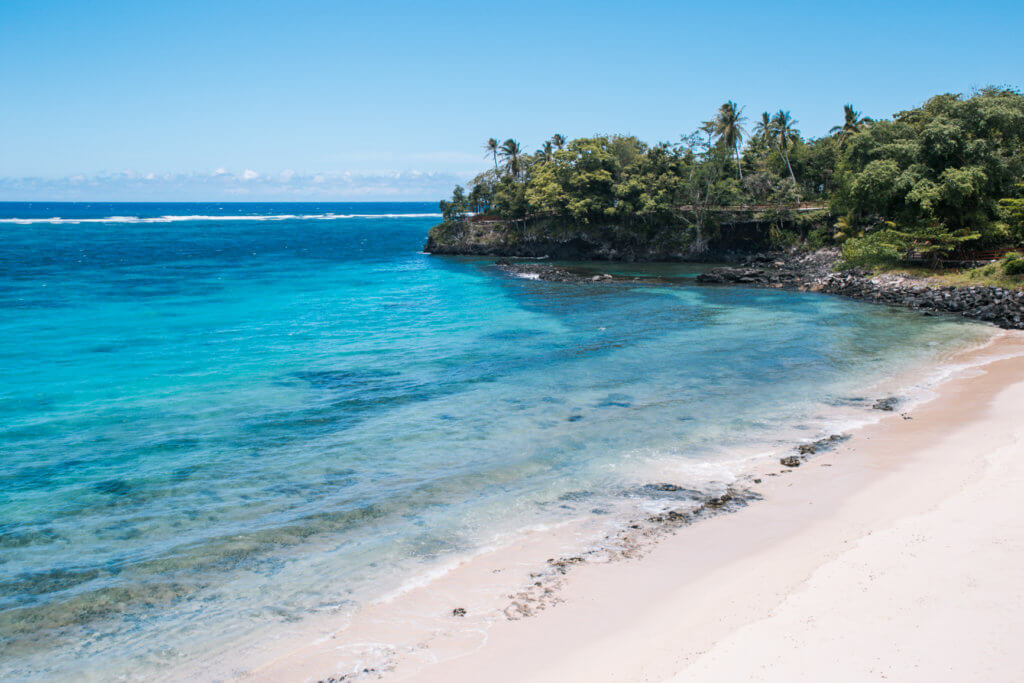 multicolored ocean white beach