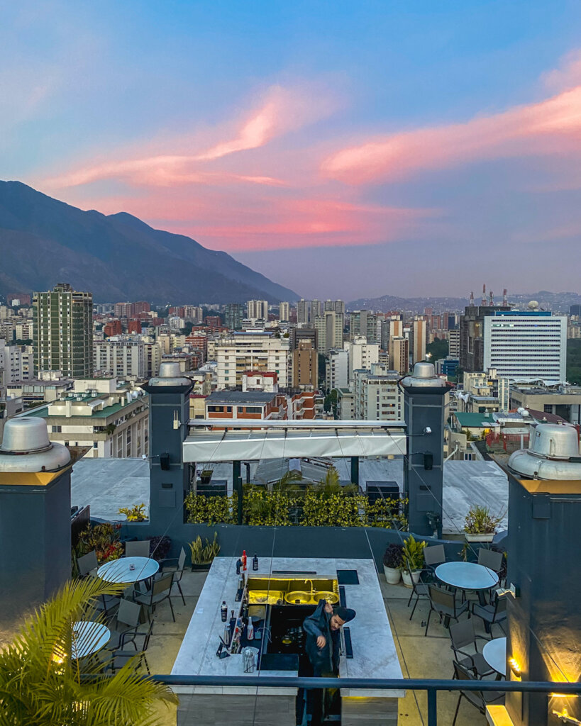 Sunset Splendor: Embracing the Skyline of Caracas from 360 Rooftop Bar on My Venezuela Travel Itinerary