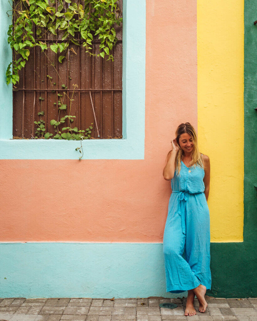 Standing on a Colorful House in Venezuela on this Travel Itinerary