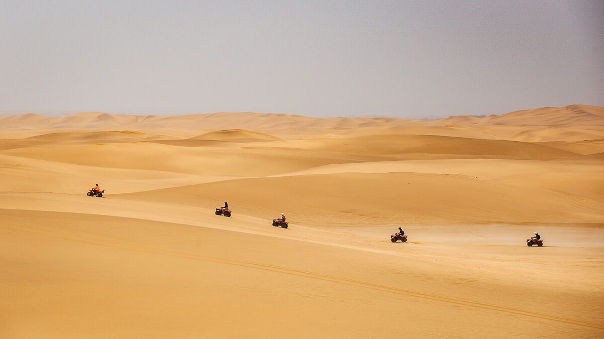 Adventurous quad biking on the vast dunes of the Namib Desert