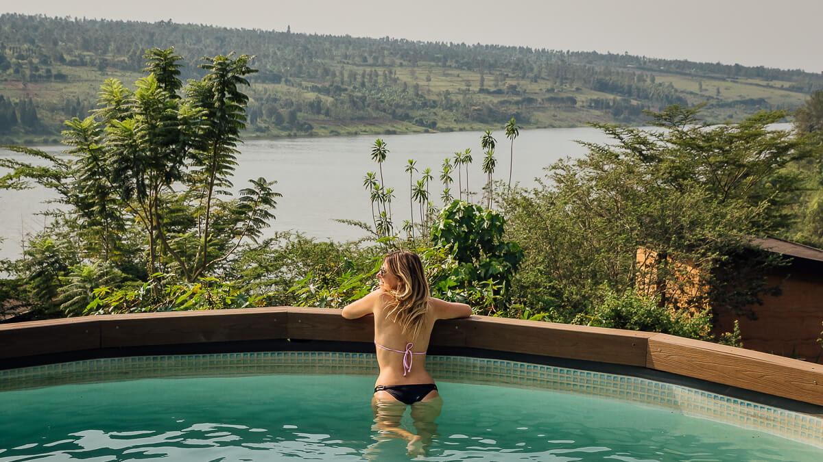 Relaxing boat ride on Lake Muhazi surrounded by lush greenery